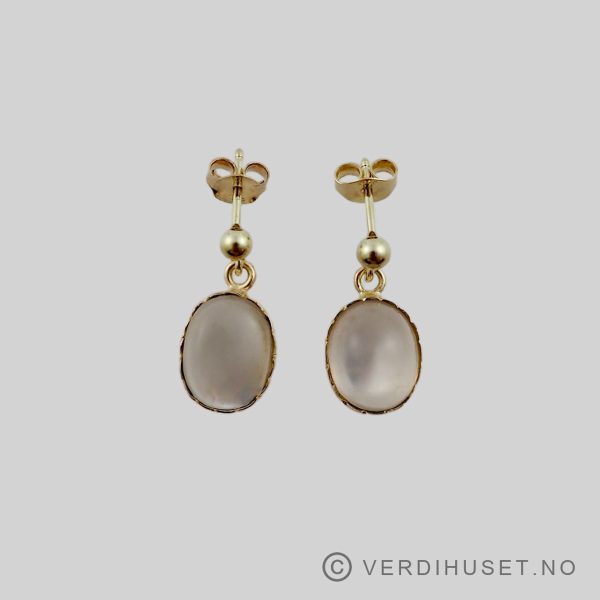 Ørepynt i 14 K gull med stener