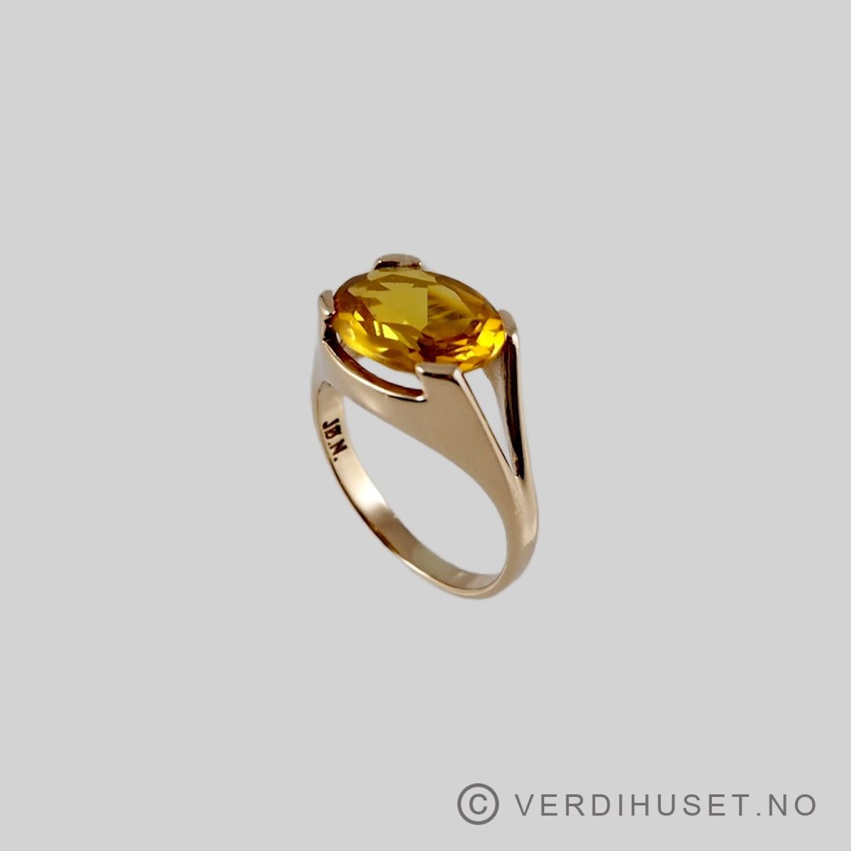 Ring i 14 K gull med gul sten
