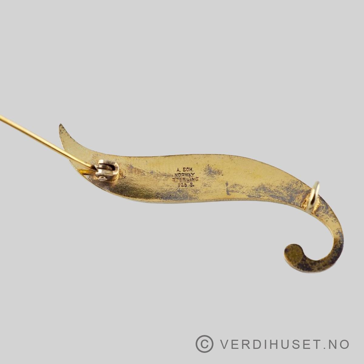 Brosje i forgylt sølv med lys blå emalje